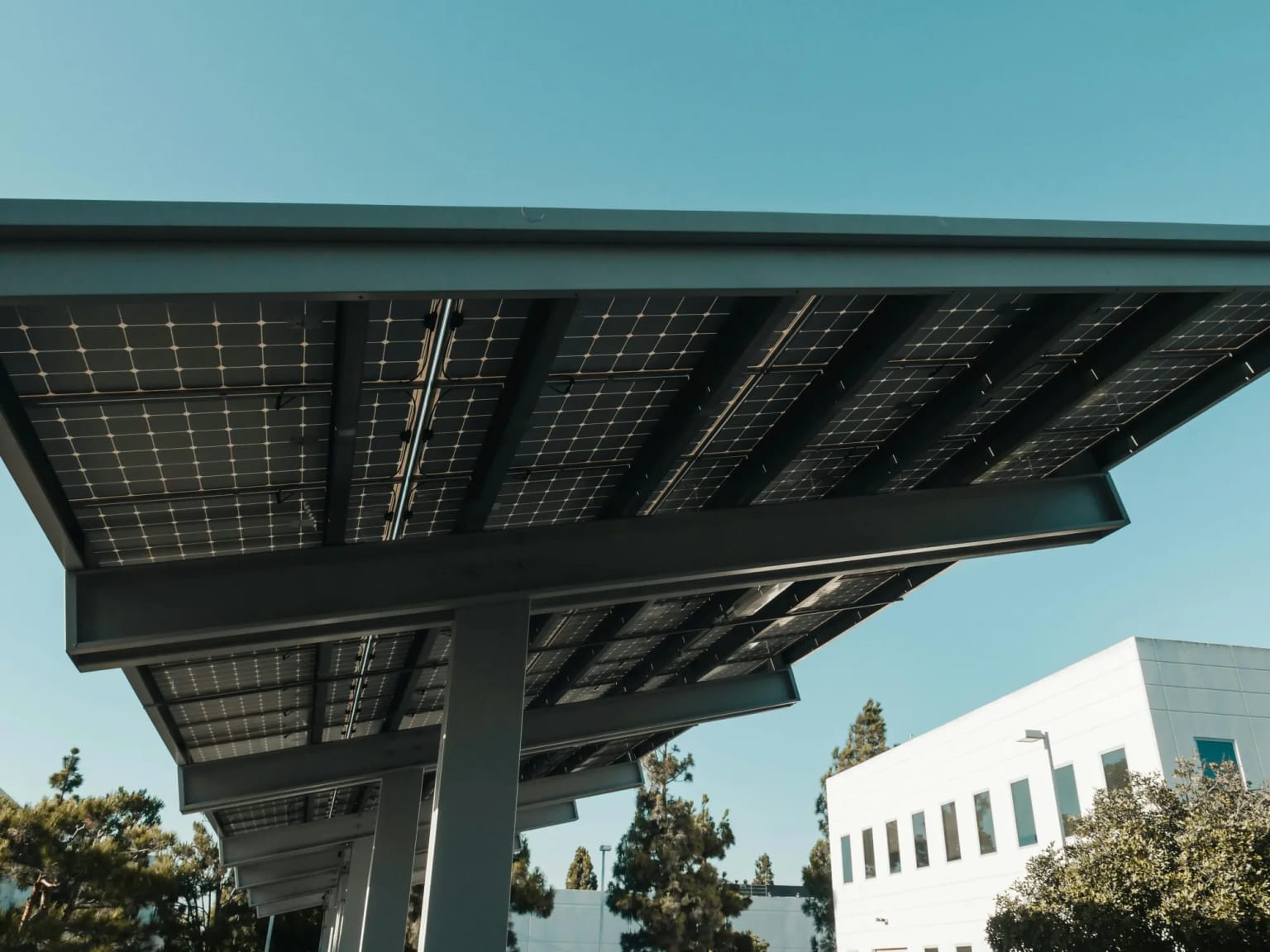 Solar carport beside a commercial office building
