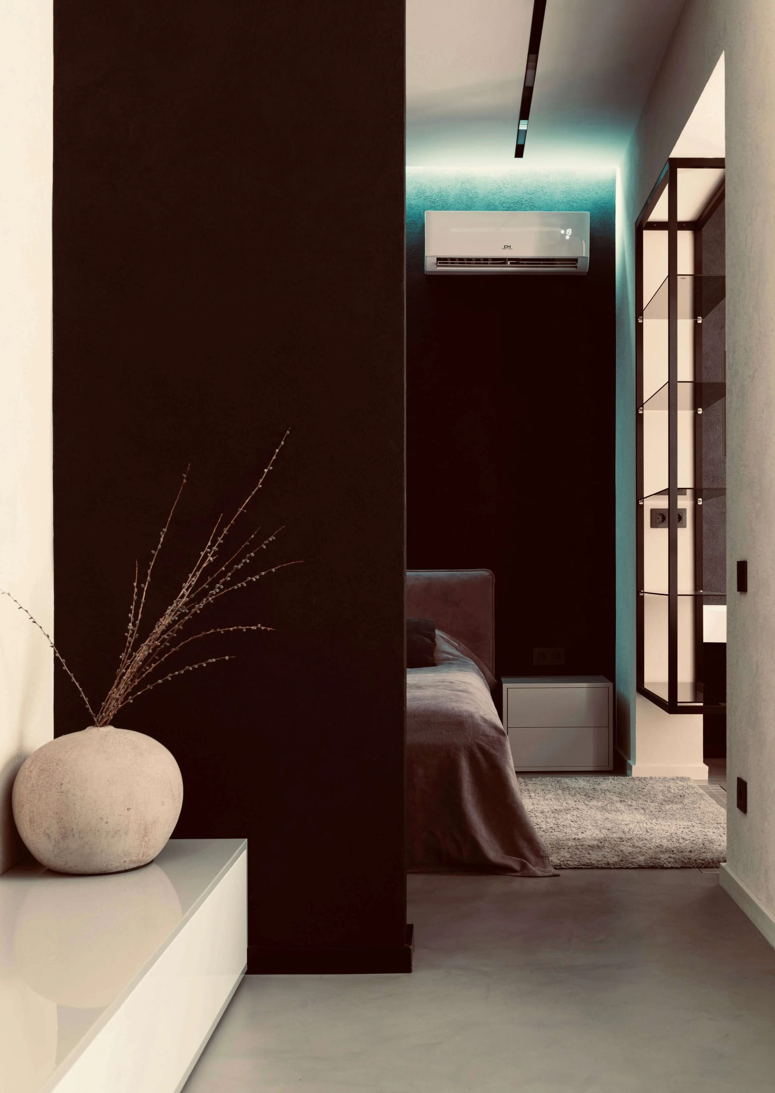 Wall-mounted split system above a bedroom doorway
